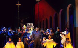 Downstage, Center; Reginald Smith, Jr. (Scarpia), Santa Fe Opera Chorus, photo by Curtis Brown for the Santa Fe Opera