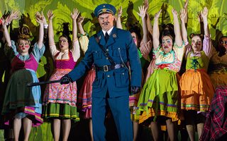 Scott Conner (Police Commissar), the Santa Fe Opera Chorus, photo by Curtis Brown for the Santa Fe Opera