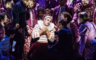 Michael Chioldi (Rigoletto), the Santa Fe Opera Chorus, photo by Curtis Brown for the Santa Fe Opera