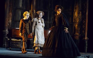 Everett Baumgarten (Miles), Annie Blitz (Flora), Jacquelyn Stucker (The Governess), photo by Curtis Brown for the Santa Fe Opera