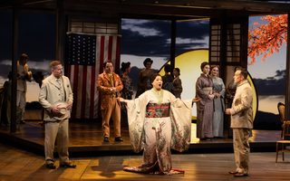 Background: The Santa Fe Opera Chorus, Ya-Chung Huang (Goro), Darya Narymanava (Mother), Sophia Baete (Aunt); Foreground: Jarrett Ott (Sharpless), Karen Chia-ling Ho (Cio-Cio-San), Stephen Costello (B.F. Pinkerton), by Bronwen Sharp for the Santa Fe Opera