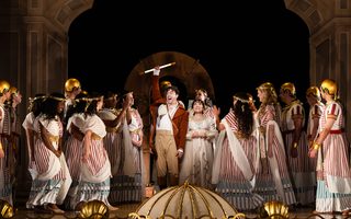 Center: Josh Lovell (Tamino), Joélle Harvey (Pamina), The Santa Fe Opera Chorus, by Bronwen Sharp for the Santa Fe Opera